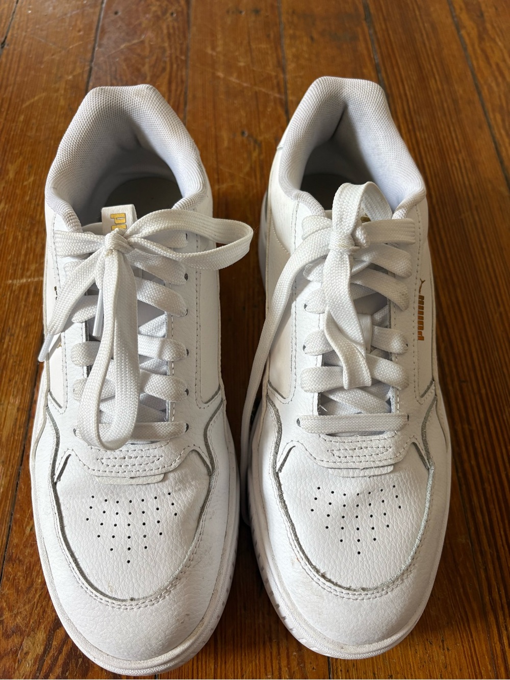 Puma White Sneakers with Gold Accent